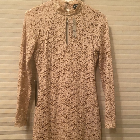 Sheer sleeve nude/tan Bebe dress size s - Picture 1 of 3